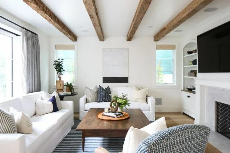 Потолок с балками дизайн фото bright white walls with natural beams from kelly nutt design Farm house living r