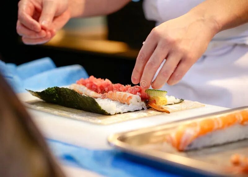 Повар суши фото Chef Hands Preparing Japanese Food, Chef Making Sushi, Preparing Stock Photo - I