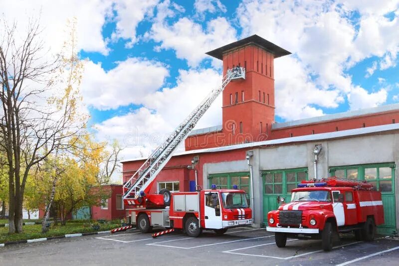 Пожарные екатеринбург фото Fire Station, Two Red Fire Truck Stock Photo - Image of danger, building: 214607