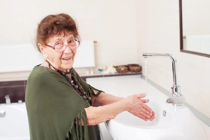 Пожилые в ванной фото Woman Washes Her Hands with Soap in Sink Stock Photo - Image of infectious, micr