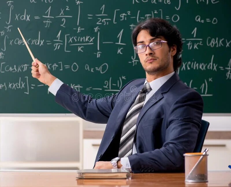 Преподаватель математики фото Young Male Math Teacher in Classroom Stock Image - Image of elementary, science: