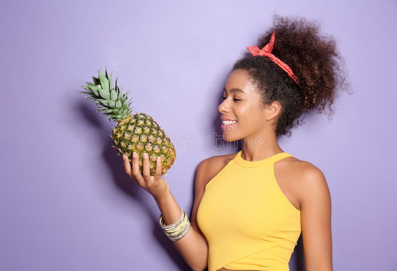 Прическа ананас женская Beautiful African-American Woman with Pineapple on Color Background Stock Image 