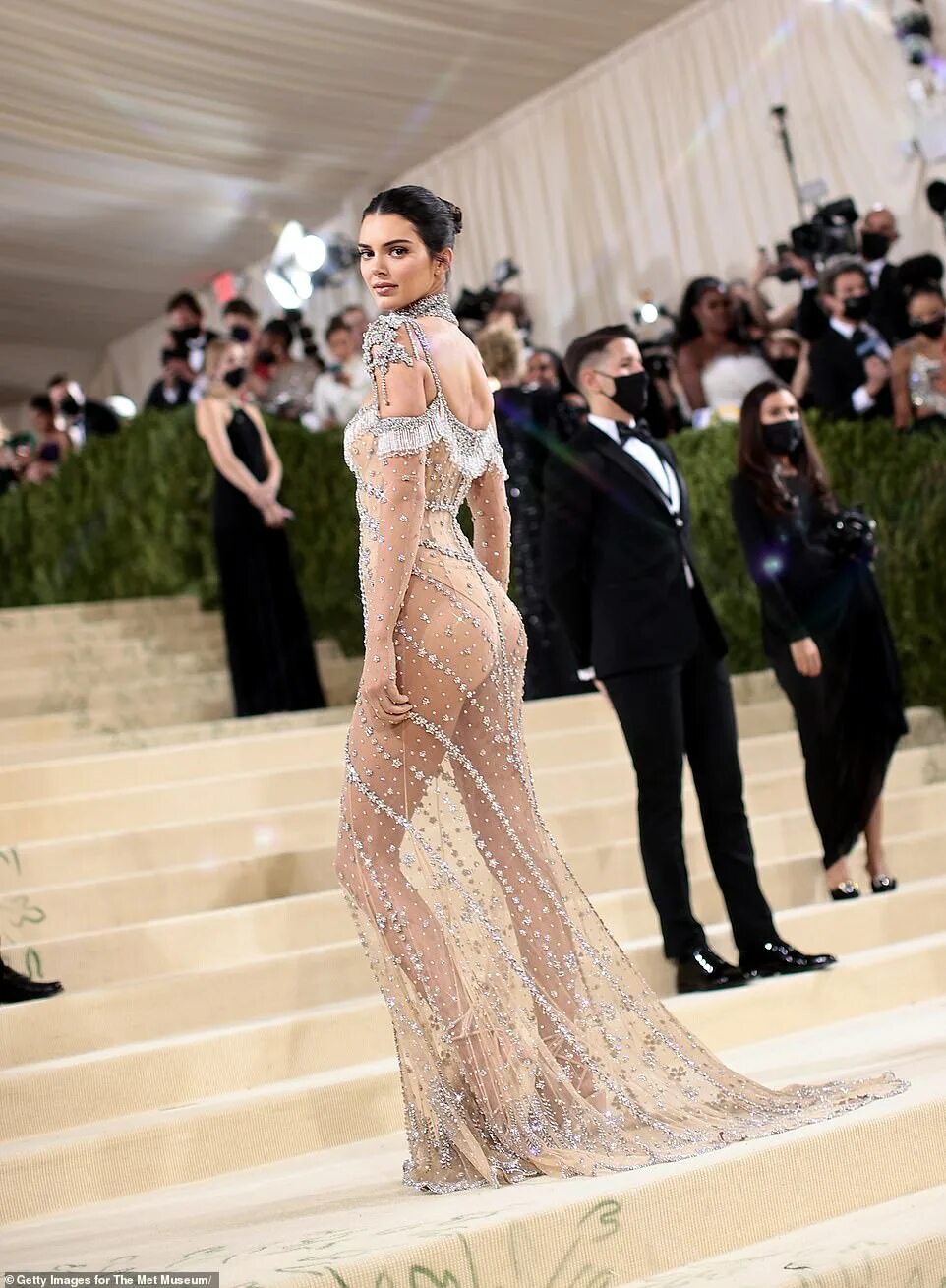 Прическа кендалл дженнер на мет гала 2024 Kendall Jenner exudes sheer elegance donning a see-through dress lavished in gem