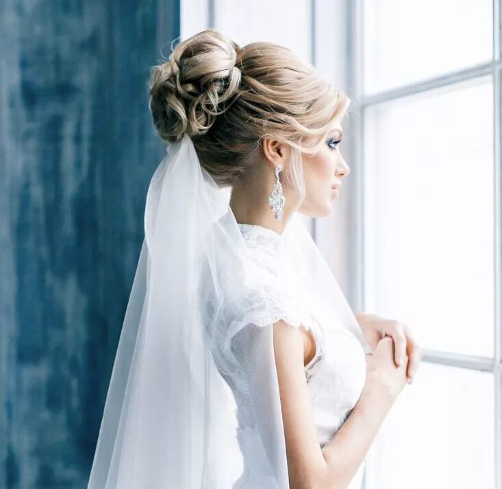 Прическа невесты 22 New Wedding Hairstyles to Try - MODwedding Wedding hairstyles with veil, Wedd