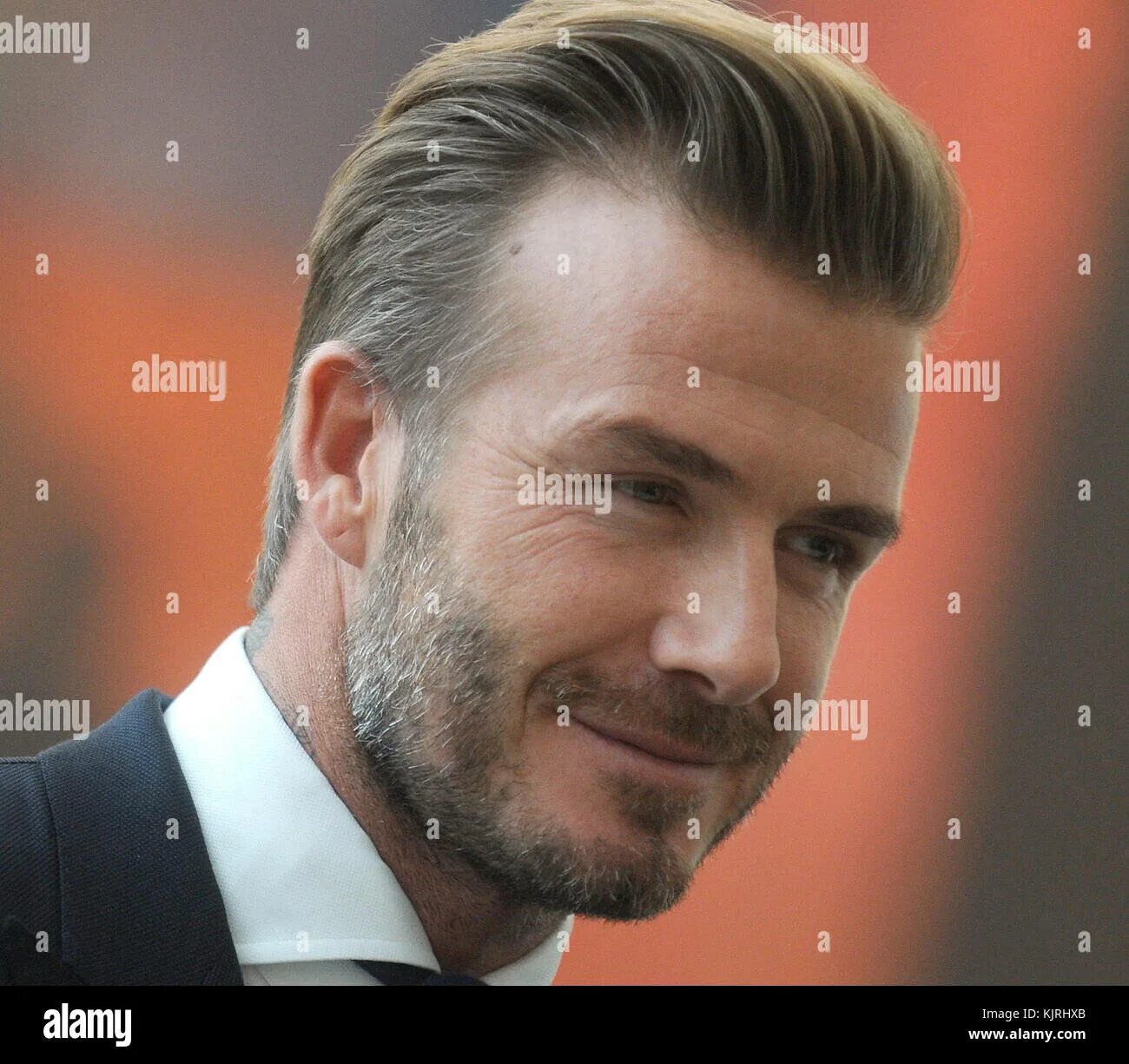 Прическа с зачесом назад мужская NEW YORK, NY - SEPTEMBER 24: UNICEF Goodwill Ambassador David Beckham listen as 