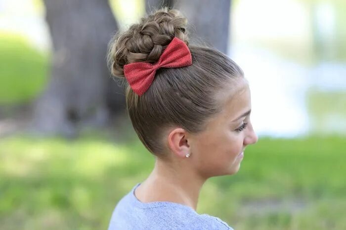 Прическа шишка для девочки cute hairstyles, braided hair bun, on a brunette child's hair, decorated with a 