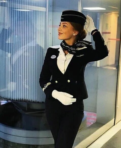 Прическа стюардессы на длинные Pin by Людмила Лошкарева on Azafatas y tripulación Flight attendant uniform, Cab