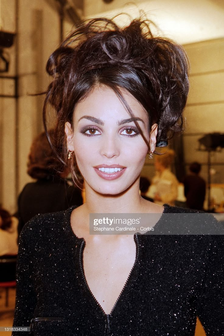 Прически 2004 года Model Ines Sastre poses backstage during the Chanel Ready to Wear... Messy hairs