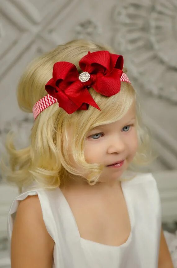 Прически для девочек с повязками This darling is ready for Christmas in her red bow chevron headband from Santeen