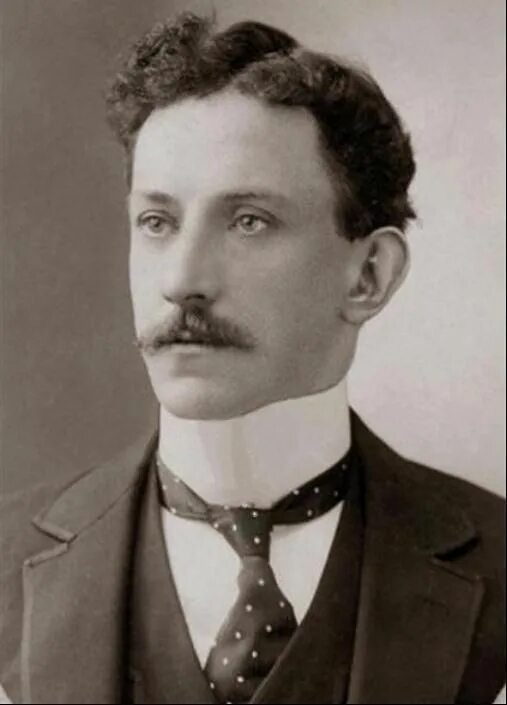 Прически мужские 1900 Young gentleman, circa 1900, wearing a very high, stiff, upright collar and tie.