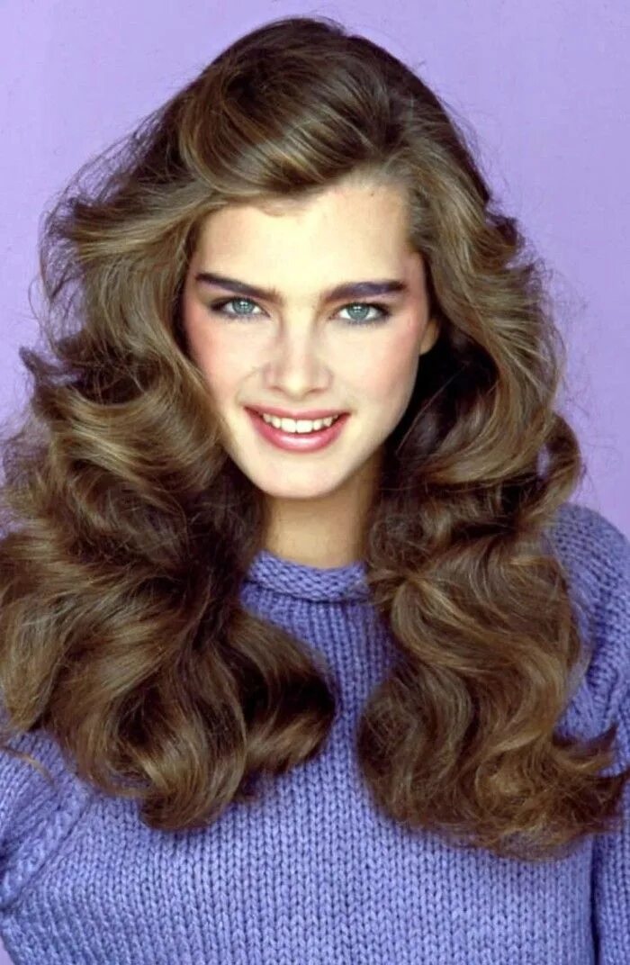 Прически на длинные волосы 90 годов knitted blue jumper, worn by young brooke shields, with long and wavy, brunette 