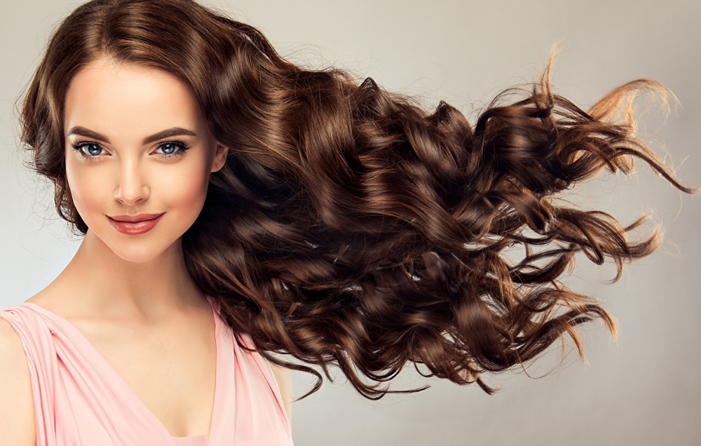 Прически волосы фото скачать бесплатно Images Brown haired curls hairstyles Hair Face young woman Glance Grow long hair