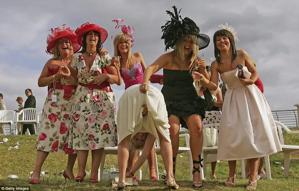 Прикольное фото женщине на 50 лет Hold onto those hats! Drunken racegoers feel the effects of a Champagne fuelled 