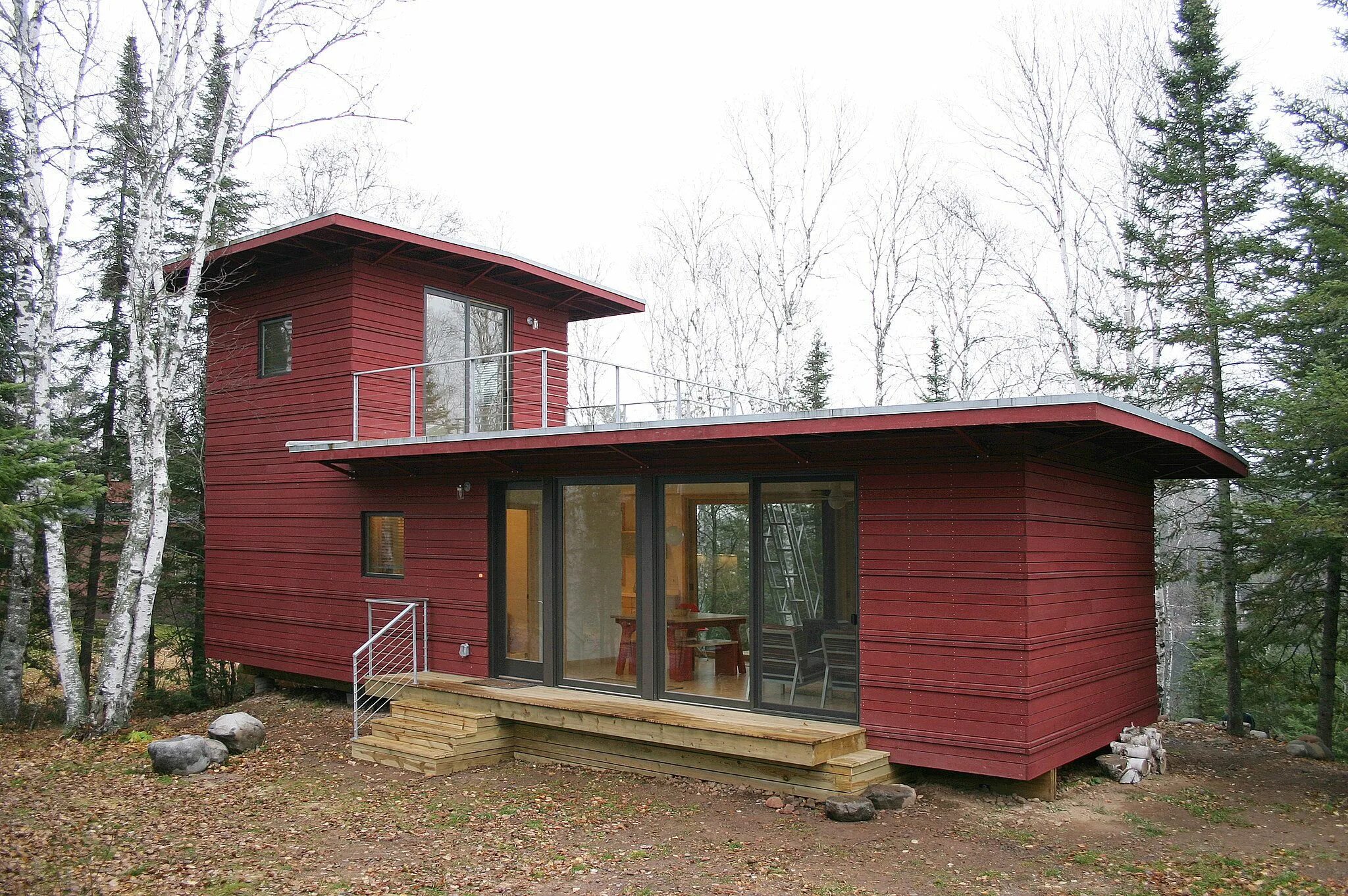 Примеры дачных домов из бытовок The McGlasson weeHouse boasts a rooftop deck, gorgeous forest views, 12 Tiny Hom