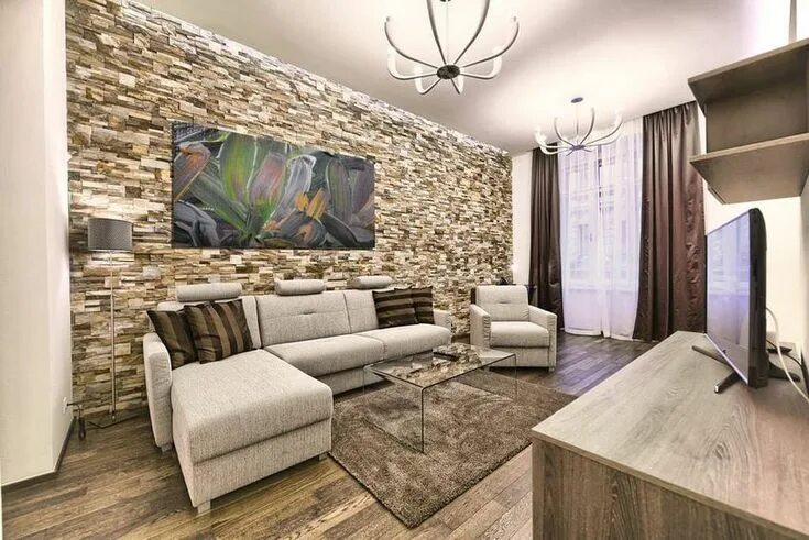 Примеры отделки стен в квартире Nappali - kő és kő hatású, természetes és dekor burkolatok Apartment interior de