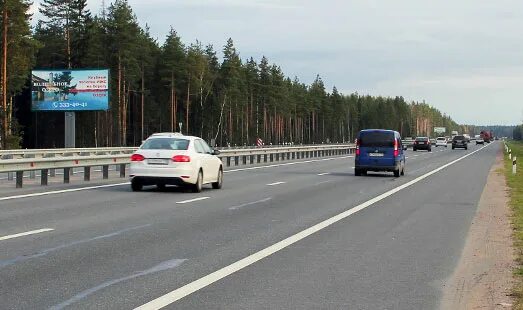 Приозерское шоссе фото Реклама на щите на Новоприозерском шоссе; 24 км 715 м