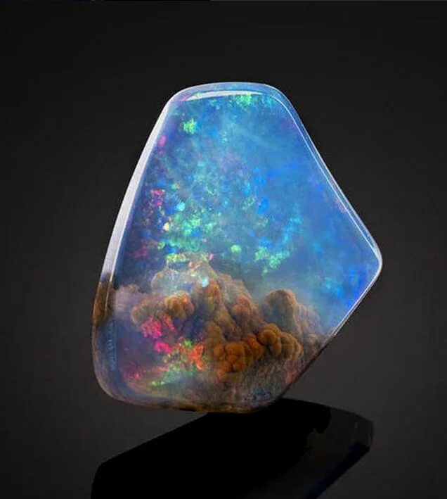 Природный опал фото Incredible space stone seems like it has a nebula trapped inside Stones and crys