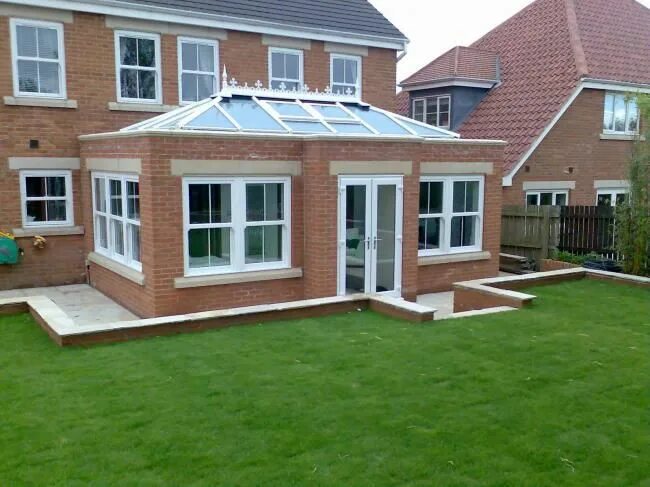 Пристройка из кирпича фото Orangery Designs Orangery Gallery - Ultraframe Orangeries Garden room extensions