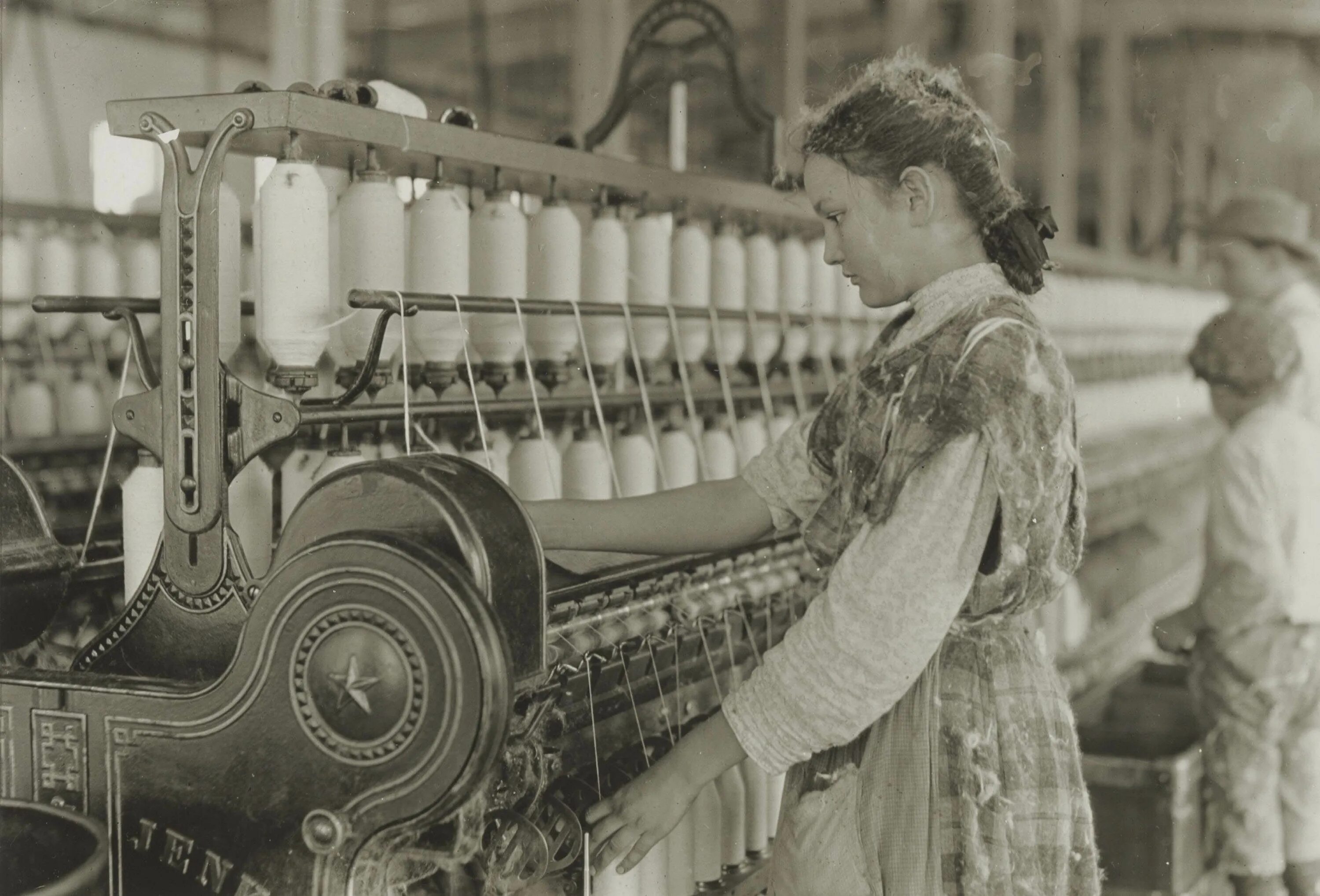 Промышленная старые фото LEWIS W. HINE (1874-1940) , Spinner in cotton mill, 1908 Christie's