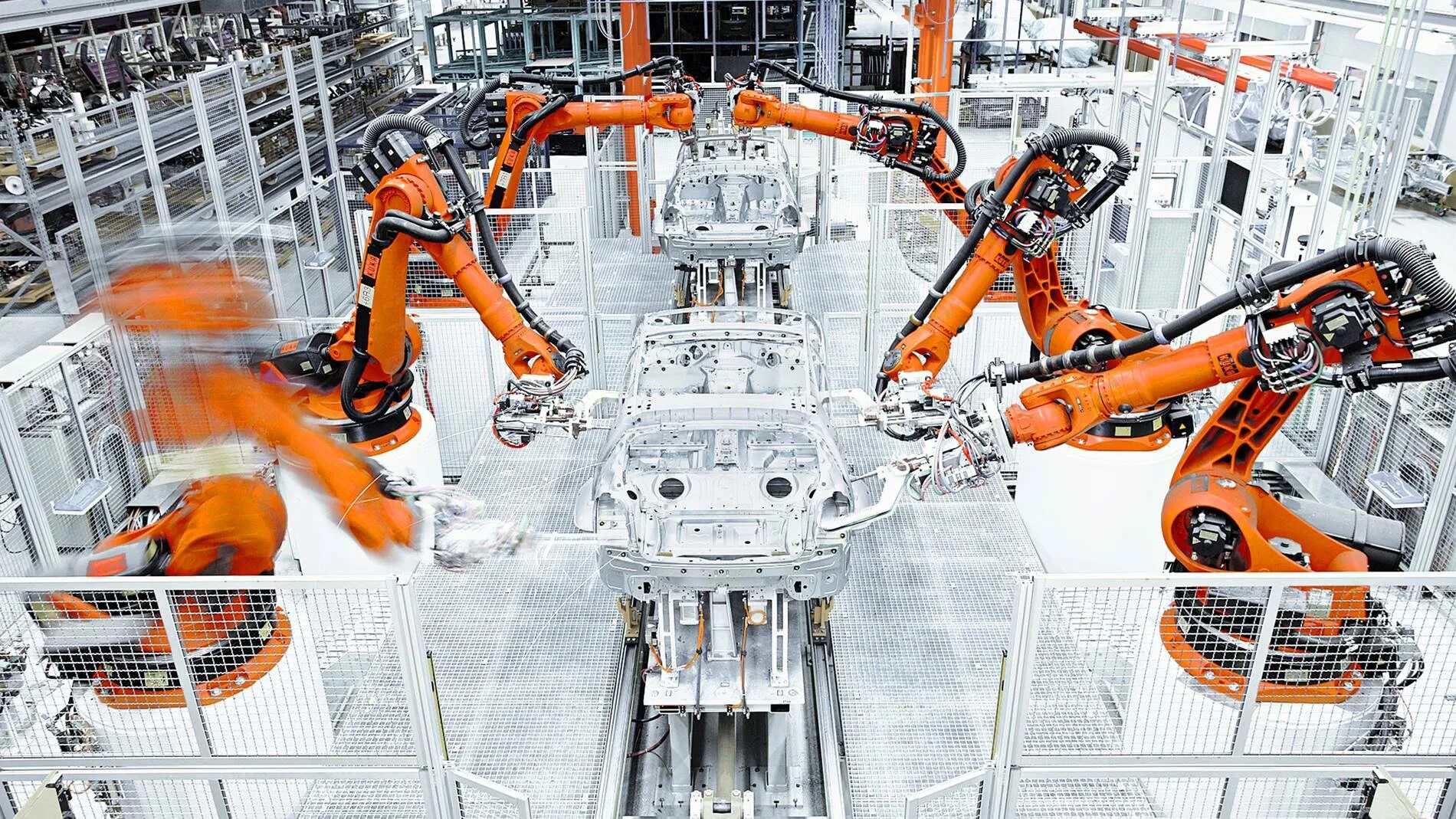 Промышленные роботы фото для презентации Body-in-white production KUKA AG