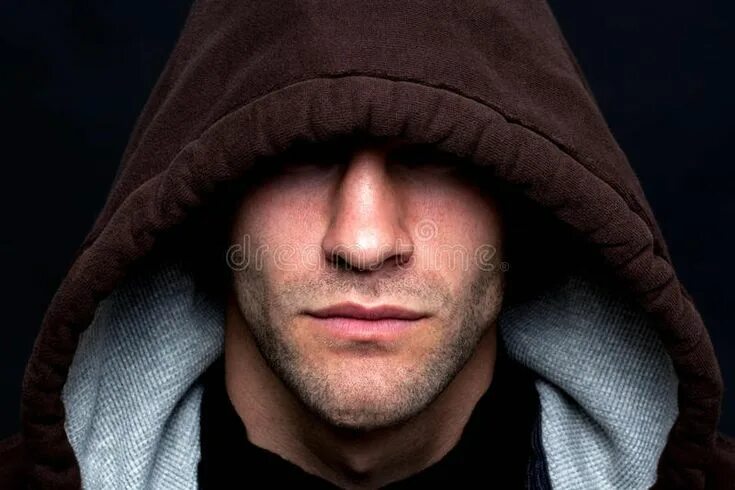 Простые фото на аватарку Evil looking hooded man. An evil looking man wearing a hooded top with his eyes 