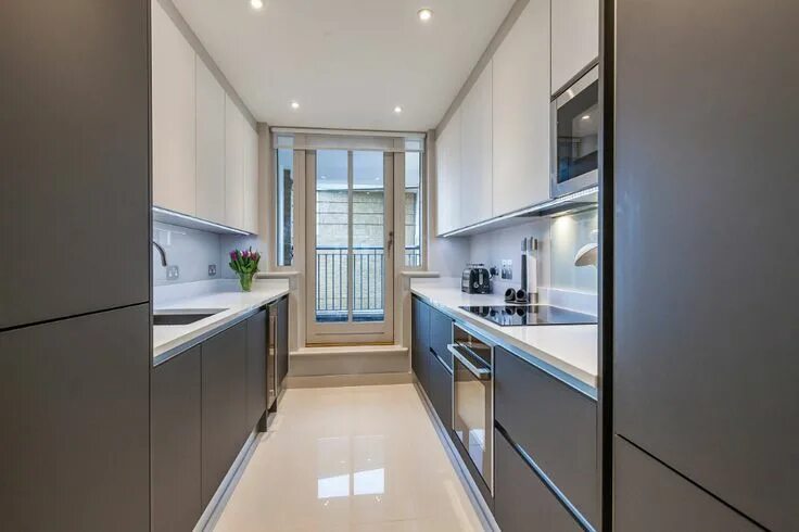 Прямоугольный кухни фото Docklands Apartment - Contemporary - Kitchen - London - by Culina Small galley k