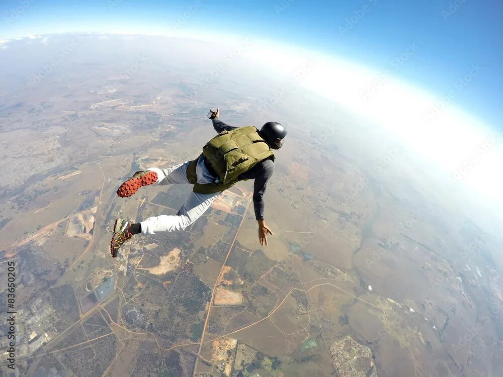 Прыжки самолета фото Skydiver in action Фотографія Stock Adobe Stock