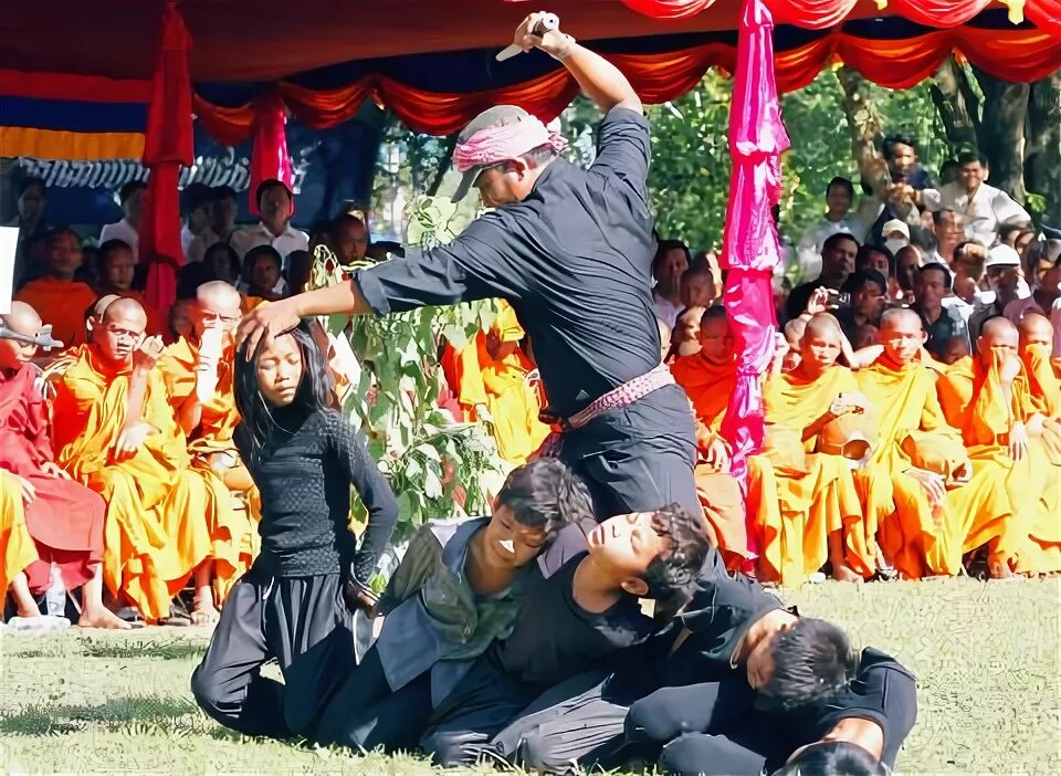 Пытка красный тюльпан фото Cambodians mark a 'Day of Anger' for Khmer Rouge victims - Taipei Times