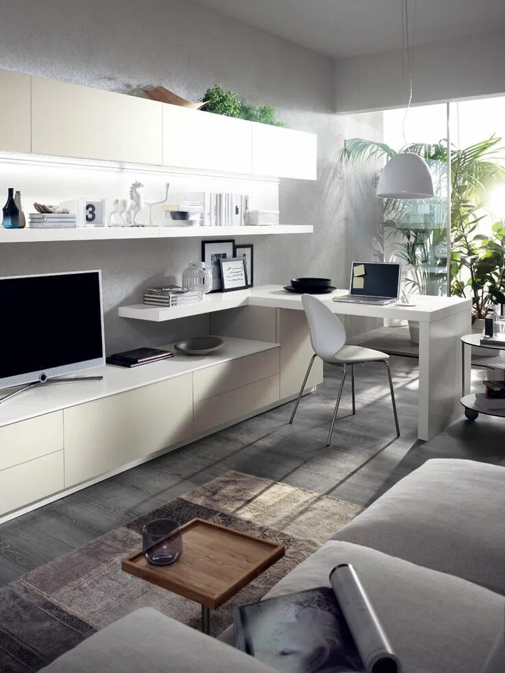 Рабочий стол в гостиной в интерьере A modern #living area also includes a desktop for study and work Arredamento, Ar