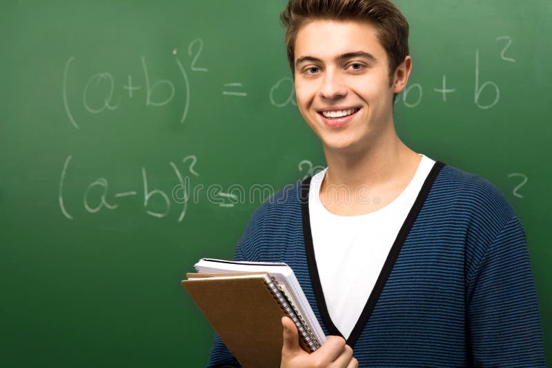 Работа по математике по фото Student Writing on Board stock image. Image of hispanic - 29648179