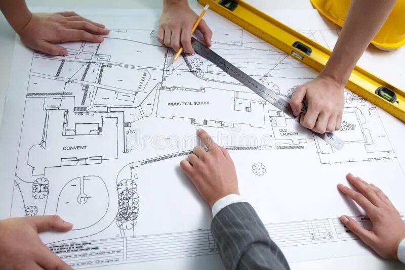 Работа с чертежами фото Discussion of Interior Hand Drawings Stock Image - Image of architecture, plan: 