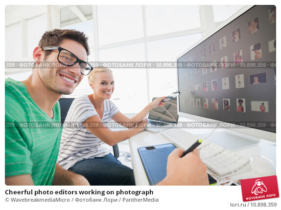 Работа с фото онлайн Cheerful photo editors working on photograph. Стоковое фото № 10898359, фотограф