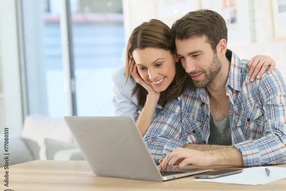 Работа в паре фото Couple at home websurfing on internet Фотографія Stock Adobe Stock