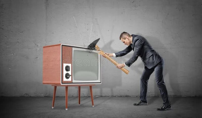 Разбил телевизор фото A Businessman on Concrete Background Fails To Smash an Old Retro TV Set with a B