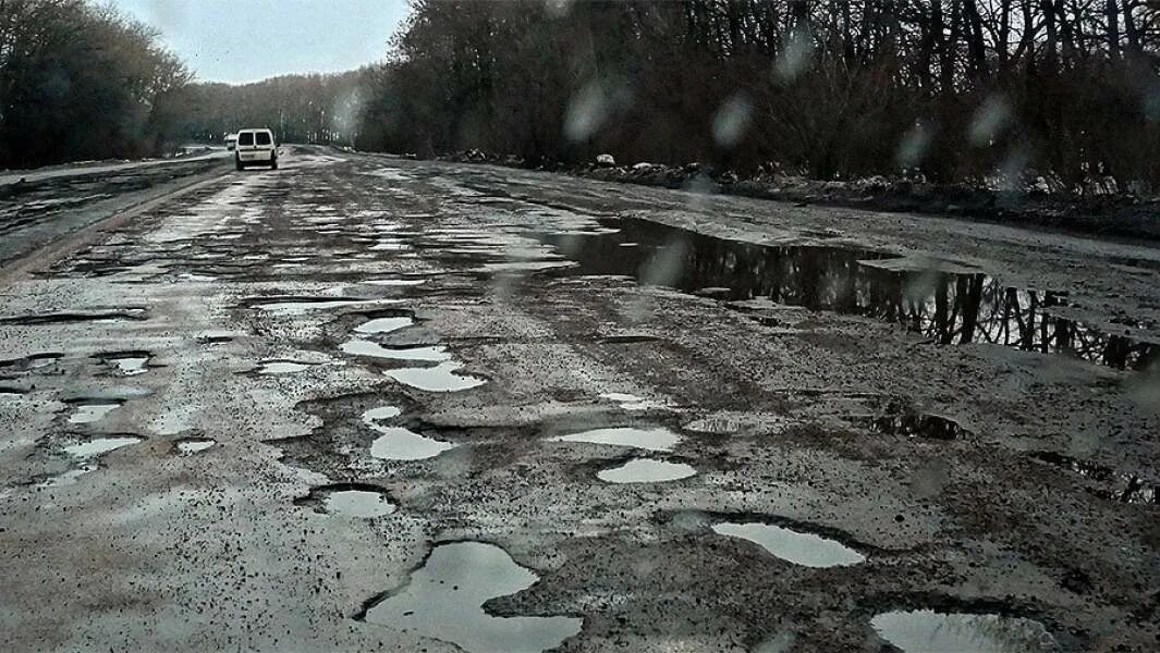 Разбитая дорога фото Шоссе без энтузиастов: главная дорога Украины стала опасна для жизни Статьи Изве