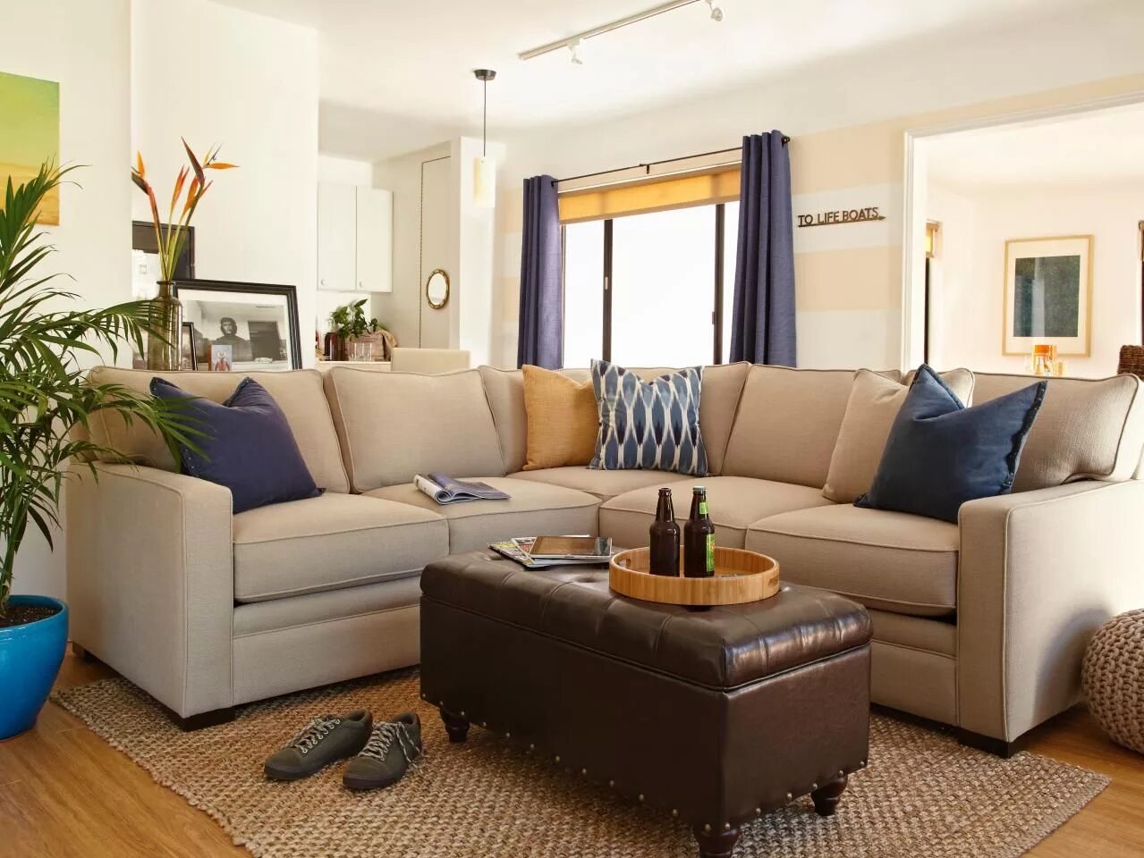 Разные диваны в интерьере гостиной Neutral Living Room With Indigo Accents Coastal living rooms, Brown living room,