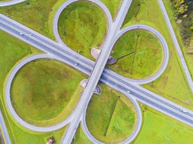 Развязка бабочка фото Aerial View of Highway in City. Cars Crossing Interchange Overpass. Highway Inte