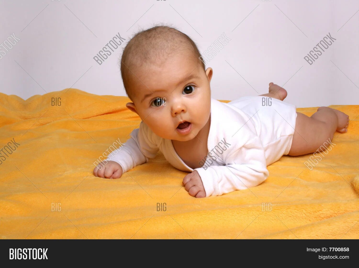 Ребенок 4 месяца фото Baby On Yellow Planket Image & Photo (Free Trial) Bigstock