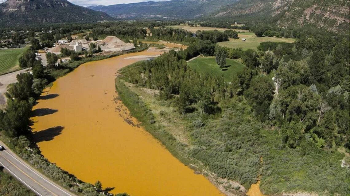 Река хуанхэ фото Toxic spill colours US river orange Newshub