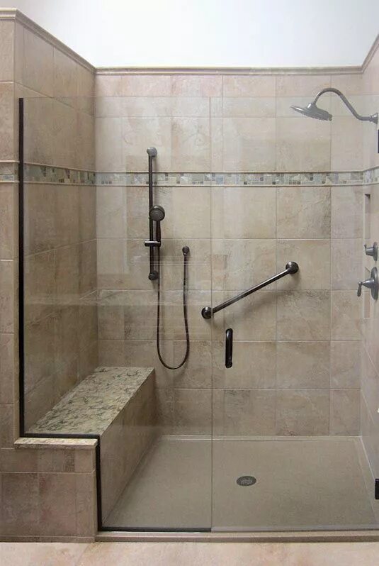 Ремонт душа в ванной своими руками Spacious shower with built-in bench, grab bar, and additional shower head. Showe