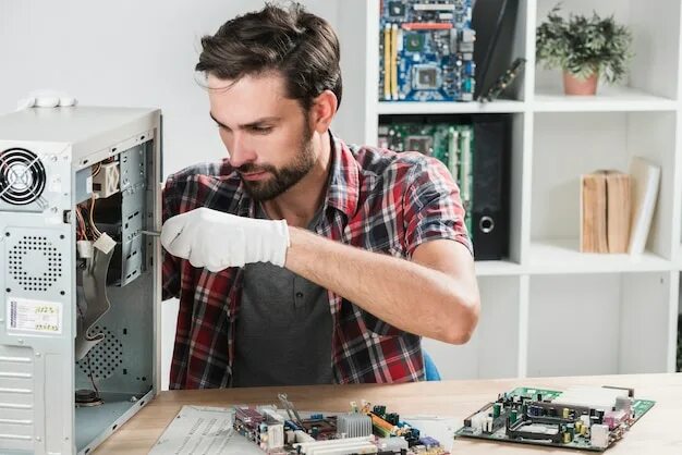 Ремонт техники своими Premium Photo Front view person repairing a motherboard