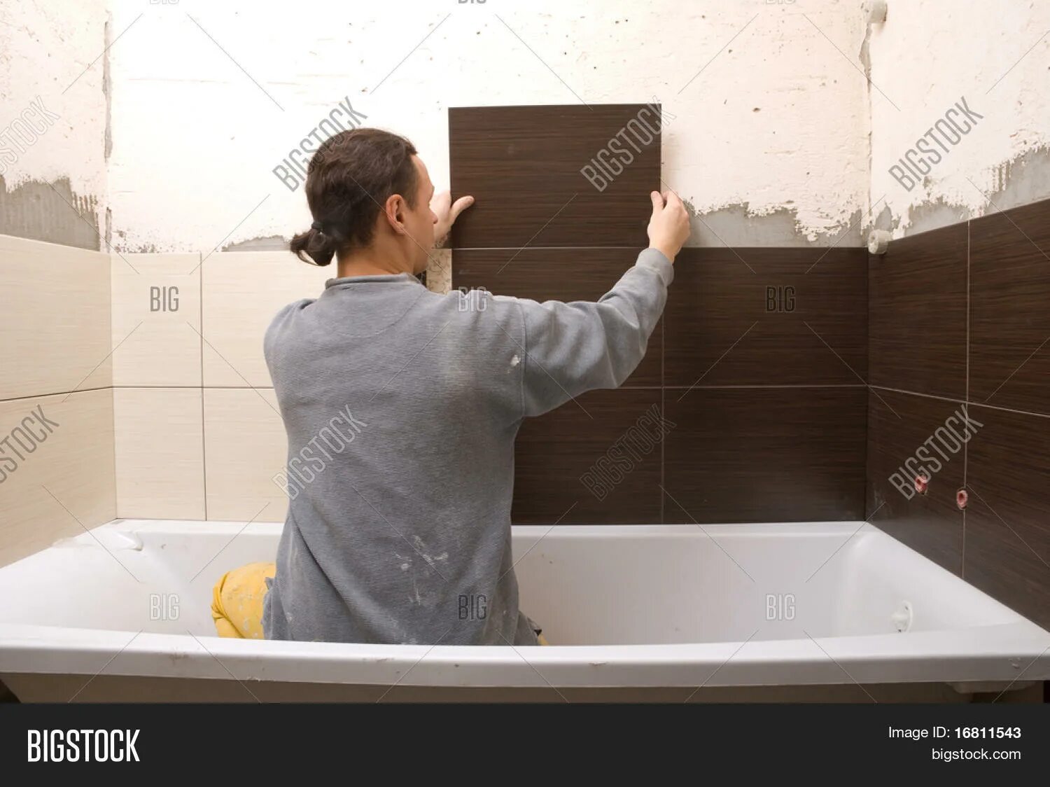 Ремонт в ванной комнате своими руками Man Tiling Wall Image & Photo (Free Trial) Bigstock