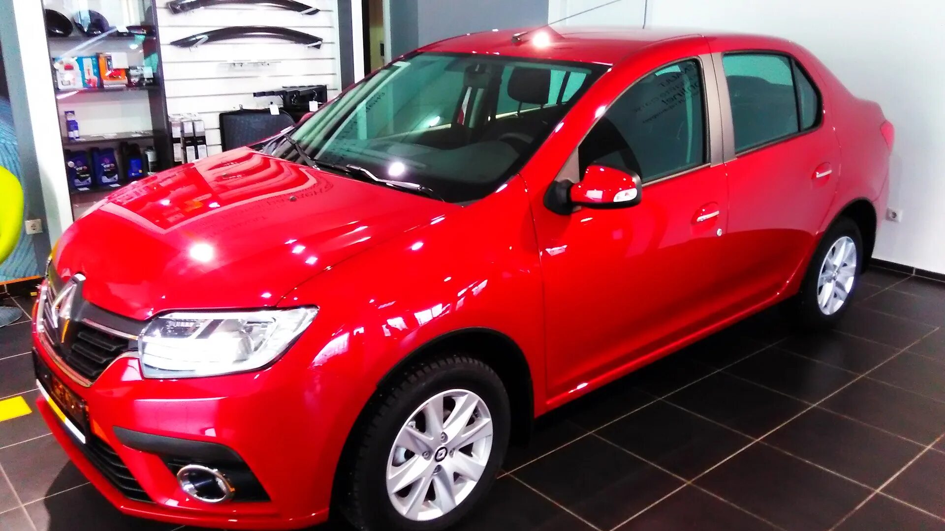 Рено красного цвета фото Renault Logan (2G) 1.6 бензиновый 2019 "Valentino red" на DRIVE2