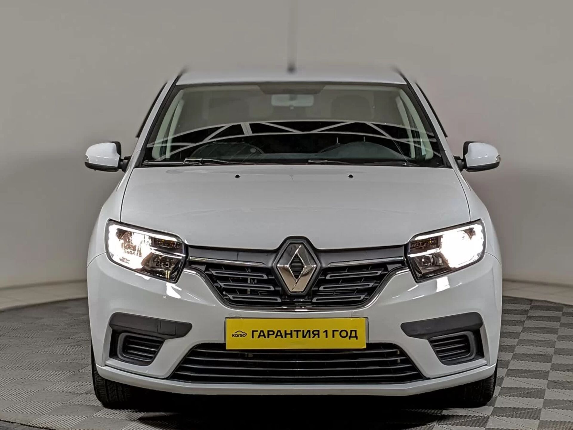 Рено логан 2021 год фото с противотуманками Renault Logan 2021 белый 1.6 л. л. 2WD автомат с пробегом 69 000 км Автомолл "Бе