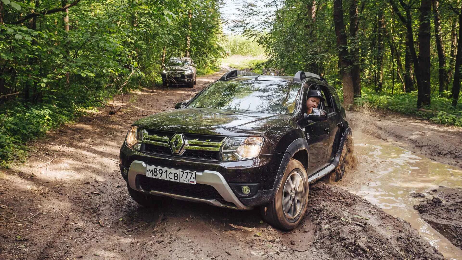 Рено паджеро фото цена Mitsubishi Pajero Sport против Renault Duster: тест-драйв