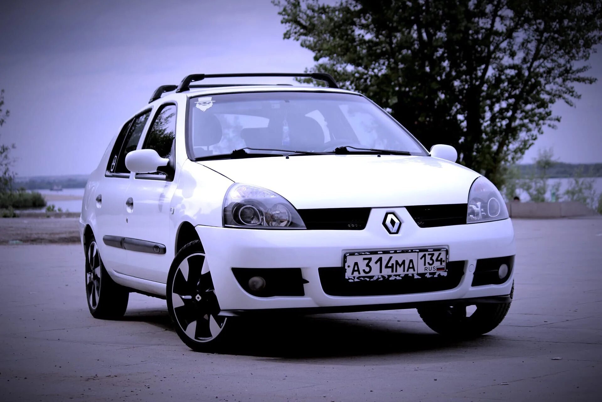 Рено симбол тюнинг фото Диски D16 и фары - Renault Symbol, 1,4 л, 2002 года стайлинг DRIVE2